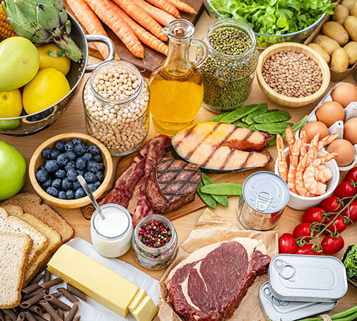 Table filled with large variety of food that are good for your kidney health.